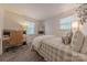Bright bedroom offers great natural light, work space and a neutral color pallette at 6418 Tivoli Ct, Charlotte, NC 28211