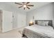 Comfortable bedroom featuring carpet, ceiling fan, and a window at 713 Torrey Pines Ln, Fort Mill, SC 29715