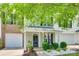 Charming two-story home with a quaint front porch and well-manicured landscaping at 713 Torrey Pines Ln, Fort Mill, SC 29715
