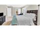Cozy bedroom featuring a comfortable bed, natural light, and soothing neutral color palette at 7339 Dover Mill Sw Dr, Concord, NC 28025