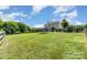 Large backyard with a trampoline and plenty of space for outdoor activities, perfect for families at 7805 Crooked Creek Church Rd, Monroe, NC 28110