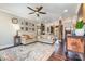 Spacious living room showcasing elegant furnishings, hardwood floors, and an open layout at 7805 Crooked Creek Church Rd, Monroe, NC 28110