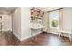 Bright office space with built-in desk, natural light, and storage shelves at 7805 Crooked Creek Church Rd, Monroe, NC 28110