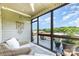 Relaxing screened porch with comfortable seating, a ceiling fan, and a beautiful view at 7805 Crooked Creek Church Rd, Monroe, NC 28110