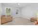 This room has neutral carpet, light walls, and two large windows for lots of light at 80 Lecline Ne Cir, Concord, NC 28025