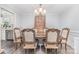Elegant dining room featuring wood floors, a chandelier, and a large dining table at 80 Lecline Ne Cir, Concord, NC 28025