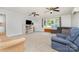 Inviting living room with ample natural light, neutral carpeting, and comfortable sofas at 80 Lecline Ne Cir, Concord, NC 28025