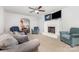 Cozy living room with fireplace, comfortable seating, and an open view to the dining area at 80 Lecline Ne Cir, Concord, NC 28025