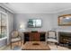 Bright living room features a fireplace, stylish furnishings, and a TV for entertainment at 8232 Sunset Hill Rd # Th88, Waxhaw, NC 28173
