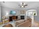 Cozy living room with a fireplace, comfortable seating, and ample natural light creating a welcoming atmosphere at 8232 Sunset Hill Rd # Th88, Waxhaw, NC 28173