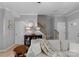 Open living space with hardwood floors, staircase, neutral paint, and modern decor at 8232 Sunset Hill Rd # Th88, Waxhaw, NC 28173
