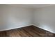 Neutral bedroom showcasing modern, wood-look flooring and fresh paint at 824 6Th Nw St # 5, Hickory, NC 28601