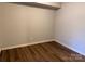 Bedroom featuring neutral walls and wood-look flooring at 824 6Th Nw St # 5, Hickory, NC 28601