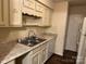 Compact kitchen featuring stainless steel sink, light countertops and cabinets at 824 6Th Nw St # 5, Hickory, NC 28601