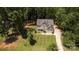 Aerial view showing this home's large front lawn and landscaping at 8402 Aspen Ct, Charlotte, NC 28227