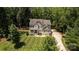 Aerial view of the home's manicured lawn and lush surroundings at 8402 Aspen Ct, Charlotte, NC 28227