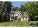 Charming two-story home featuring a well-manicured lawn and inviting curb appeal at 8402 Aspen Ct, Charlotte, NC 28227