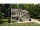 Charming two-story home with a welcoming front porch and manicured lawn at 8402 Aspen Ct, Charlotte, NC 28227