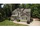 Charming two-story home with a welcoming front porch and manicured lawn at 8402 Aspen Ct, Charlotte, NC 28227