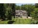 Aerial shot of the home's exterior showing lawn and landscaping at 8402 Aspen Ct, Charlotte, NC 28227