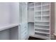 Walk-in closet featuring built-in shelves and drawers, great for storage at 8402 Aspen Ct, Charlotte, NC 28227