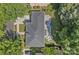 A bird's eye view of a home featuring a patio, fire pit and manicured yard with mature trees at 9427 Gilpatrick Ln # 5, Huntersville, NC 28078