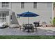 Outdoor patio with a table and grill, great for cooking and dining al fresco at 9427 Gilpatrick Ln # 5, Huntersville, NC 28078