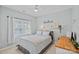 Light and airy bedroom with a ceiling fan, light blue walls and a window at 9427 Gilpatrick Ln # 5, Huntersville, NC 28078