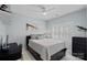 Bedroom featuring a full bed, ceiling fan, window and a desk at 9427 Gilpatrick Ln # 5, Huntersville, NC 28078