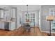 Breakfast area featuring a glass top table with seating and large windows for plenty of natural light at 9427 Gilpatrick Ln # 5, Huntersville, NC 28078