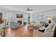 Comfortable living room with hardwood floors, fireplace, and stylish decor creating a cozy ambiance at 9427 Gilpatrick Ln # 5, Huntersville, NC 28078