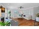 Spacious living room featuring hardwood floors, a fireplace, and comfortable seating at 9427 Gilpatrick Ln # 5, Huntersville, NC 28078