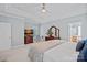 Comfortable main bedroom features a tray ceiling and neutral paint and carpet at 9427 Gilpatrick Ln # 5, Huntersville, NC 28078