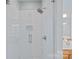 Modern bathroom shower with white subway tile and a glass enclosure for a clean and contemporary design at 9427 Gilpatrick Ln # 5, Huntersville, NC 28078