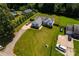 Beautiful aerial view featuring a well-manicured lawn, long driveway, and ample parking at 958 Hillard Ln, Lincolnton, NC 28092