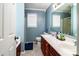 Bathroom featuring double vanity, window, toilet and adjacent shower and tub at 958 Hillard Ln, Lincolnton, NC 28092