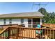Cozy outdoor deck with comfortable seating, ideal for relaxing and enjoying the outdoors at 958 Hillard Ln, Lincolnton, NC 28092