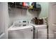 Well-organized laundry room with modern LG washer and dryer, plus shelving at 958 Hillard Ln, Lincolnton, NC 28092