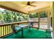 Inviting screened porch with outdoor seating, offering a relaxing view of the backyard at 958 Hillard Ln, Lincolnton, NC 28092
