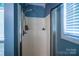 Clean and bright shower stall with a mounted shower head at 958 Hillard Ln, Lincolnton, NC 28092