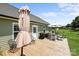 Outdoor deck with patio seating and a shade umbrella, perfect for entertaining at 100 Royal Ave, Albemarle, NC 28001