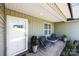 Charming front porch with a cozy seating area and inviting ambiance at 100 Royal Ave, Albemarle, NC 28001