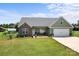 Charming home with a well-manicured lawn and attractive landscaping at 100 Royal Ave, Albemarle, NC 28001