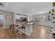 Eat-in kitchen with granite countertops, wooden cabinets, and stainless steel appliances is great for cooking and dining at 100 Royal Ave, Albemarle, NC 28001
