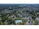 Aerial view of neighborhood featuring the home, pool, clubhouse, and local school nearby at 1112 Wagner Ave # 335, Fort Mill, SC 29715