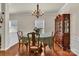 Elegant dining room with hardwood floors and a charming chandelier, great for Gathering meals and gatherings at 1112 Wagner Ave # 335, Fort Mill, SC 29715