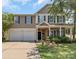Charming two-story home with a two-car garage, stone accents, and well-maintained landscaping at 1112 Wagner Ave # 335, Fort Mill, SC 29715