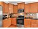 Well-equipped kitchen featuring stainless steel appliances and sleek black countertops at 1112 Wagner Ave # 335, Fort Mill, SC 29715