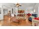Inviting living room featuring hardwood floors, a ceiling fan, and a comfortable seating arrangement at 1112 Wagner Ave # 335, Fort Mill, SC 29715