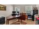 Well-lit home office with modern desk setup, carpet, providing a comfortable and productive workspace at 1112 Wagner Ave # 335, Fort Mill, SC 29715